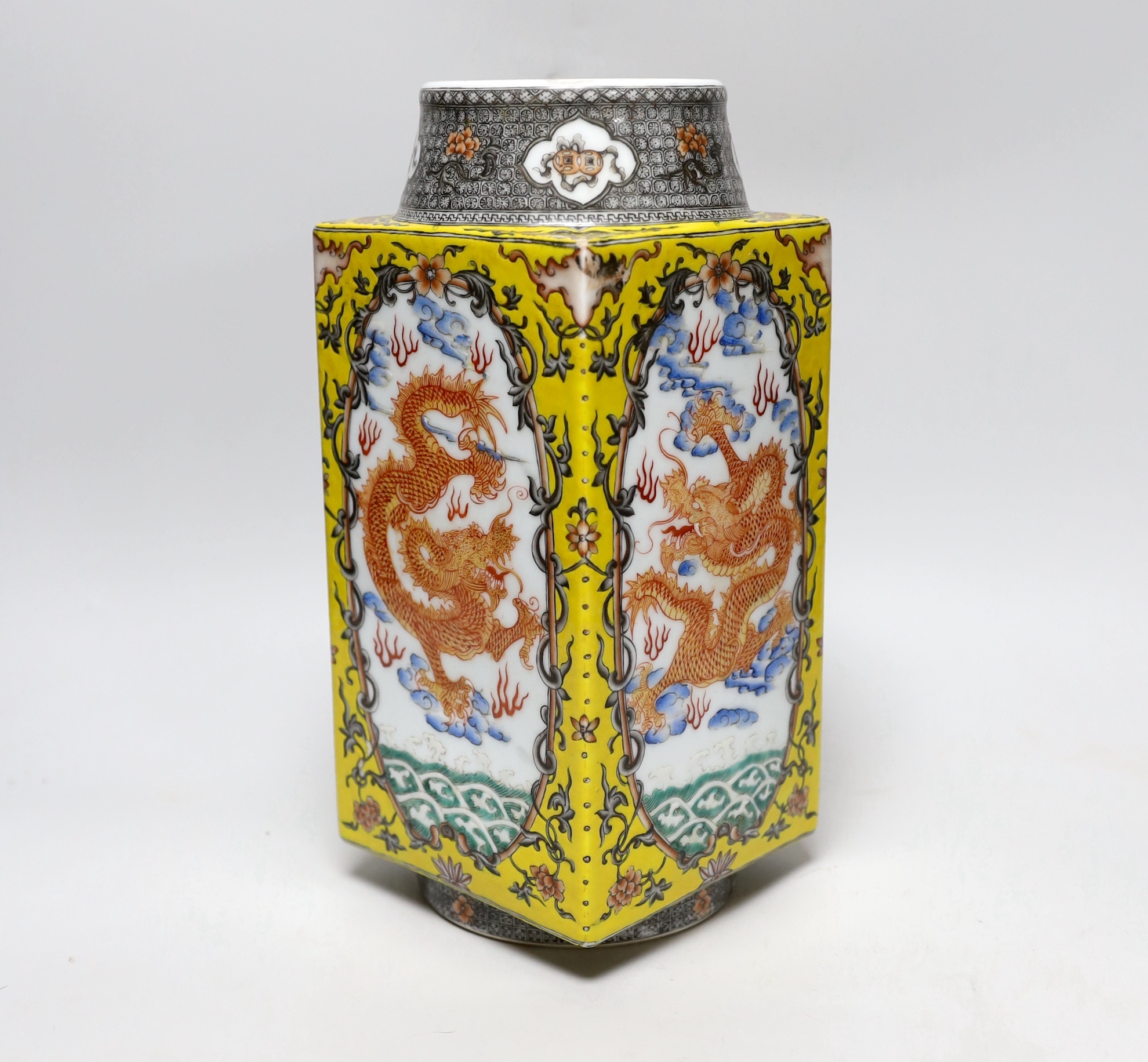 A Chinese enamelled porcelain cong-shaped vase, decorated with dragons chasing the flaming pearl, 29cm high